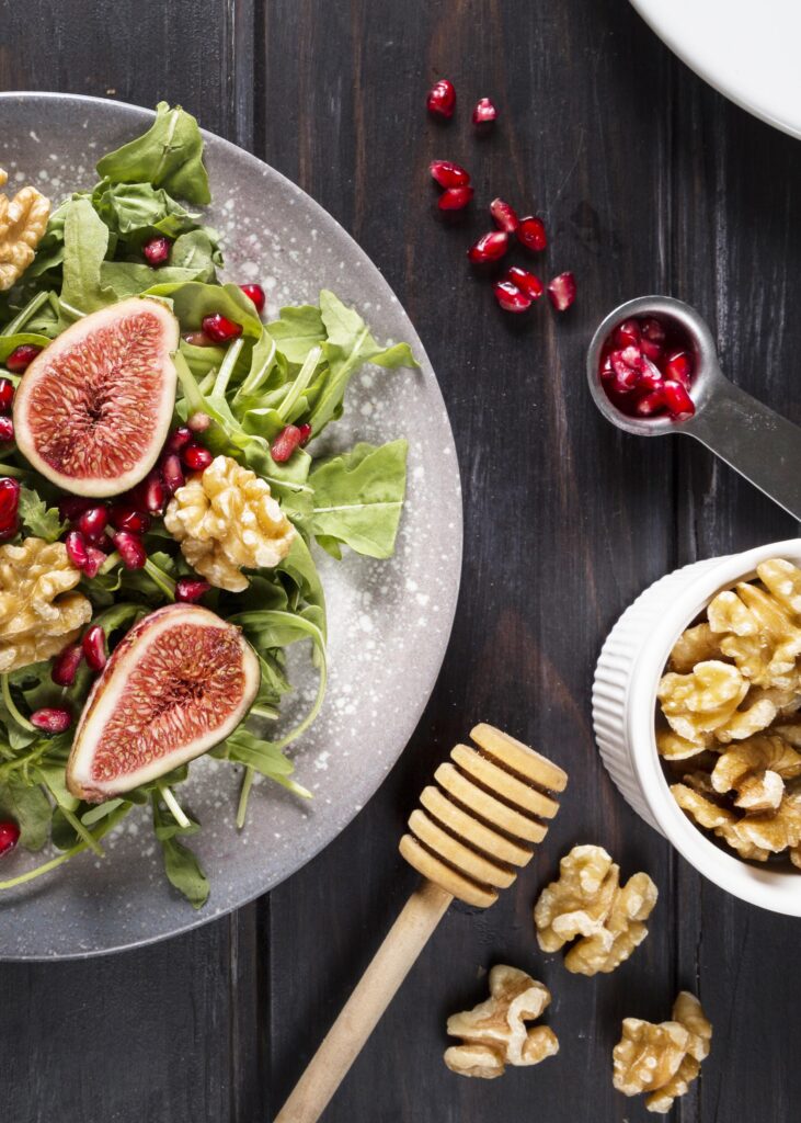 flat lay autumn fig salad plate with walnuts