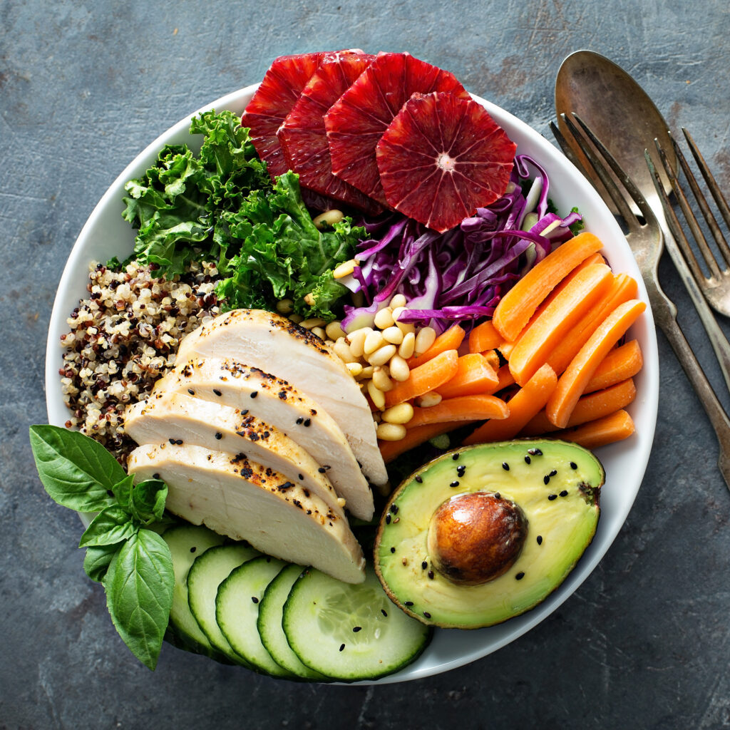 healthy lunch bowl with chicken and quinoa